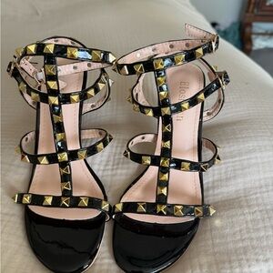 Black and Gold heels size 4.5